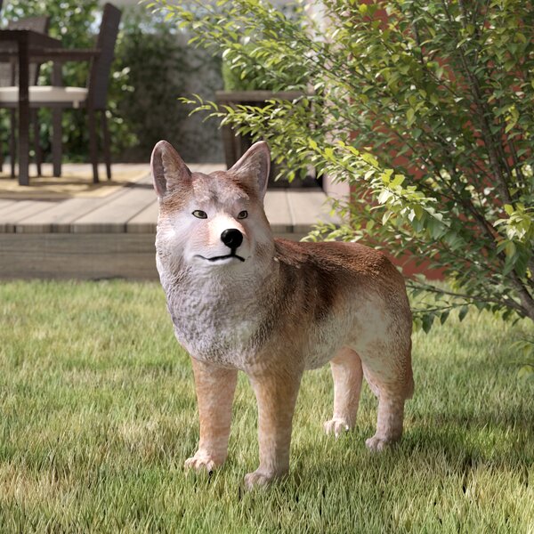 wooden coyote statue